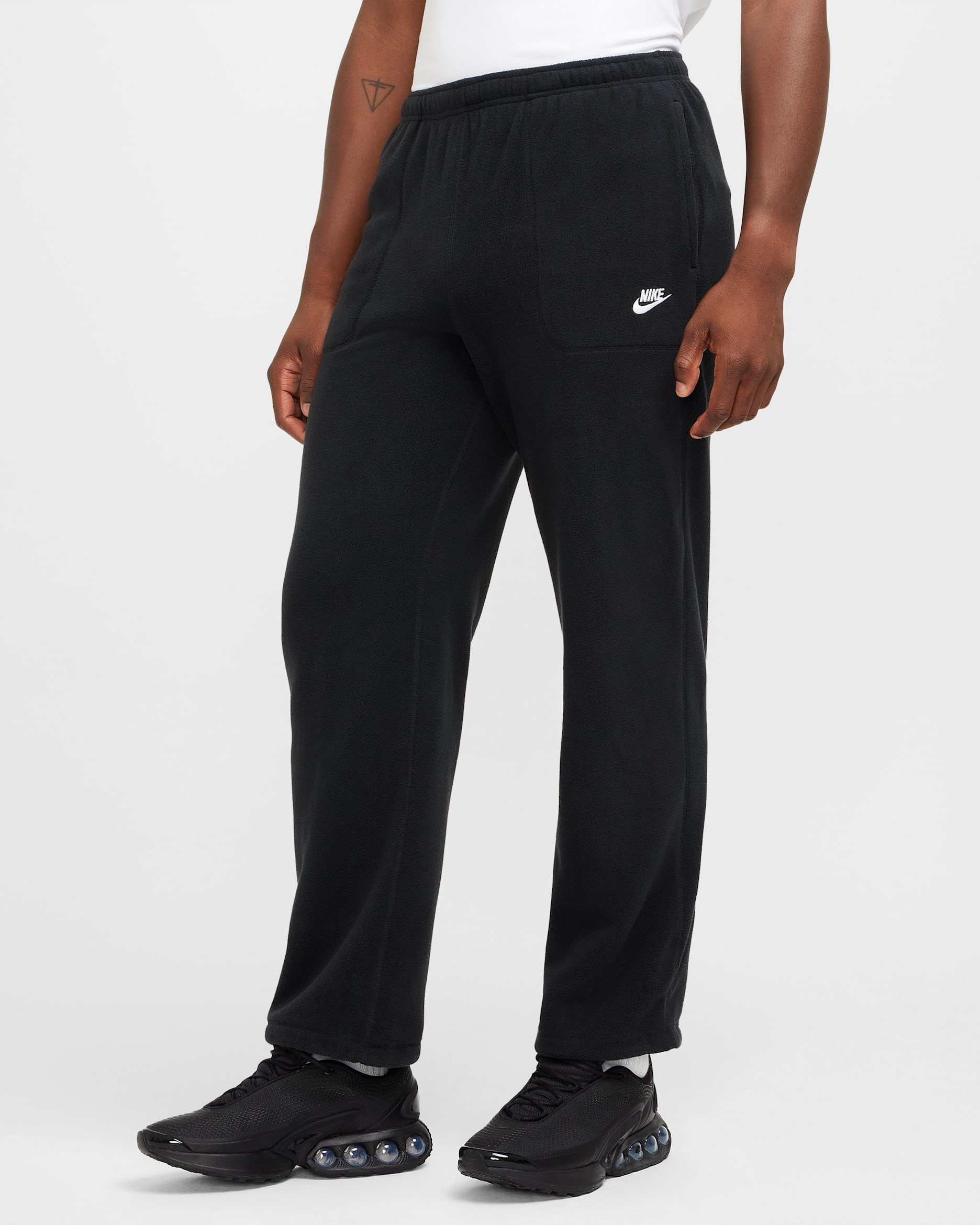 Nike Sportswear Club Men's Winterized Trousers. Nike IL